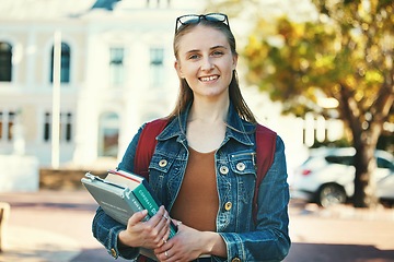 Image showing Education, campus and college portrait of student with books, backpack and ready for back to school learning. Scholarship study, knowledge commitment and studying woman happy at university building