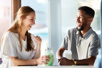 Image showing Restaurant, dating and couple drink smoothie and having conversation, talking and chatting. Love, relationship and man and woman sitting in urban cafe enjoying juice, laughing and speaking together