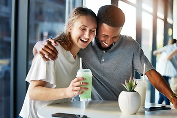 Image showing Dating, restaurant and couple with smoothie drink hugging, having fun and laughing together on romantic date. Love, relationship and interracial couple enjoying milkshake, cocktail and juice in cafe