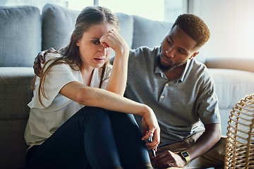 Image showing Depression, sad and compassion with a man and woman comforting or consoling in a home living room. Couple, love and support with a male and female together in trust, hope or empathy for mental health