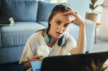 Image showing Freelance, remote work and tired, woman feeling stress, depression or anxiety while on a laptop frustrated with glitch, error or internet. Stressed entrepreneur drinking milkshake while working