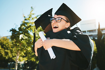 Image showing Hug, graduation and students smile, success for achievement and happy outdoor in gown. Female graduate, embrace and completed degree for education, certificate and diploma at university and college.