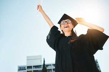 Image showing Success, graduation and woman or student with certificate, degree or diploma low angle. Graduate, celebration and female scholar happy with academic achievement, university goals or education targets