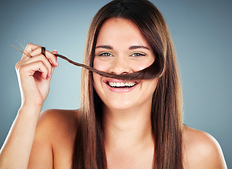 Image showing Hair, hair care and woman in cosmetic and beauty portrait, keratin and hairstyle against studio background. Straight hair, growth and clean with haircare and texture in cosmetics mock up.