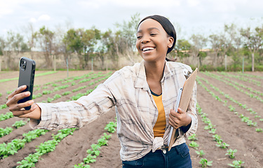 Image showing Black woman, farm and agriculture selfie with farmer in harvest field for farming and sustainability outdoor. Smile in picture, smartphone and clipboard for crop check and inspection, green and soil.