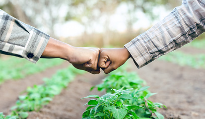 Image showing Farming, agriculture and fist bump for b2b business deal, partnership or agreement on an agro farm with hands for trust, teamwork and growth. Man and woman farmer together for support in ecology