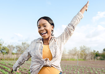 Image showing Happy black woman, farmer and celebrate in portrait for success, harvest or goal in farming industry. Woman, agriculture or celebration outdoor on agro land with happiness, smile and countryside farm