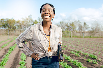 Image showing Inspection, farming and black woman doing check on agriculture, food and plants on a farm. Sustainability, ecology and portrait of a happy, young and nature farmer working with notes in countryside