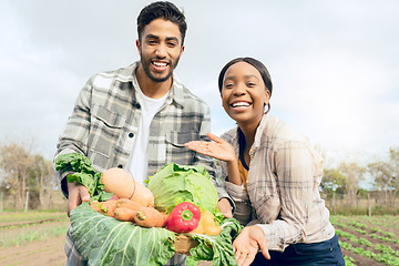 Image showing People, farm and portrait of man and woman with vegetable harvest in a basket on a agriculture field. Box, teamwork and interracial farming couple for eco friendly and sustainable produce vegetables