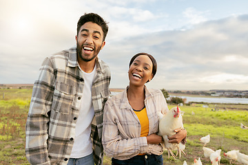 Image showing Farm, chickens and agriculture with a couple farming together on organic land in the poultry industry. Field, energy and environment with a man and woman farmer working in agricultural sustainability