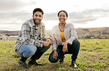 Image showing Farm, agriculture and portrait of happy couple on grass field kneeling together for teamwork. Diversity, sustainability and happy man, woman and agro farmers preparing for plant farming work outdoors