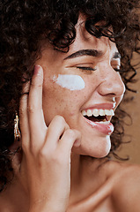 Image showing Happy woman, face cream and beauty, makeup product and sunscreen facial treatment for aesthetic shine. Young model, face freckles and body lotion, cosmetics and healthy skincare, wellness and melasma