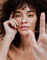 Image showing Skincare, hand and portrait of woman in studio for beauty, makeup and glamour skin cosmetic treatment. Portrait, face and black woman serious about hair care, natural hair and luxury afro grooming