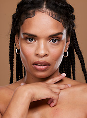 Image showing Beauty, hair care and face of black woman in studio on brown background for fashion. Cosmetics, wellness and portrait of serious girl model for hair salon products for natural, healthy and long hair