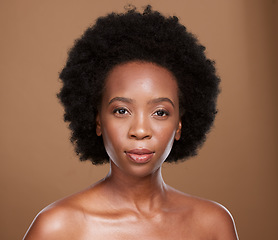 Image showing Black woman, beauty portrait and afro hair, skincare and facial treatment for shine, glow or healthy skin on studio background. African model, curly hair and aesthetic makeup, cosmetics and self care