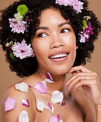 Image showing Beauty, makeup or black woman hair with flower portrait in brown studio background for skincare or luxury wellness with smile. Spring model, cosmetics or face of American girl with flowers for summer
