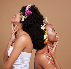 Image showing Beauty, skincare and flowers in curly hair of black women for product, luxury and spring. Natural, creative and friends with girl model and art flower crown for self love, hair care and floral