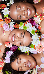 Image showing Black women, flowers and skincare wellness of diversity, cosmetic and facial health with plants. Black woman top view with cosmetics, body care and healthy flower with a smile about dermatology