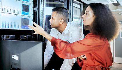 Image showing Server room, team and repair of computer hardware for cloud computing, cloud and cyber security. Database, datacenter and software engineers fixing dashboard equipment for information technology