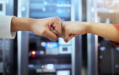 Image showing Fist bump, coding teamwork and programming server room of cyber data security storage, coding networking and futuristic hardware. Code programmer, iot solidarity and internet technology collaboration