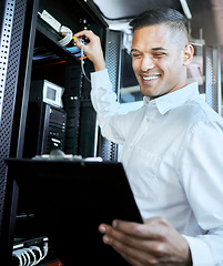 Image showing Server room, IT support and database with a man programmer working on a mainframe in a data center. Software, cyber security and innovation with a male coder at work on a cloud for host networking
