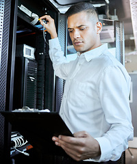 Image showing Server room, database and IT support with a man programmer working on an information storage solution. Documents, cybersecurity and cloud computing with a male coder at work in a data center