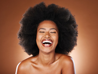 Image showing Black woman, skincare beauty and hair care model with healthy afro, natural cosmetics empowerment and happy laugh. Portrait of proud, confident and beautiful young African girl in studio background