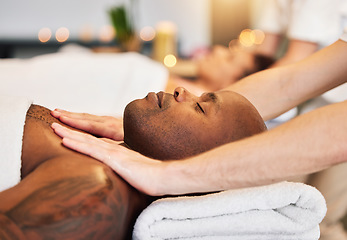 Image showing Massage, spa and black man with therapist hands, relax and skincare with zen, peace and wellness on bed. Physical therapy, healing and body therapy, relaxing and luxury treatment with therapist hand