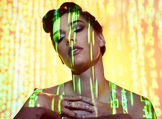 Image showing Futuristic, neon and projection on cyberpunk woman thinking with edgy makeup and hair style in studio. Dystopian, projection and 3d glow illumination on girl with serious face contemplating future.