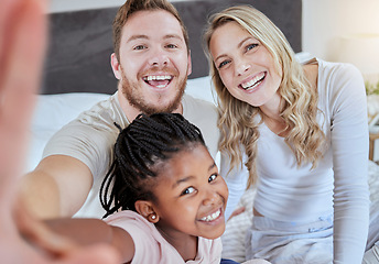 Image showing Family, adoption and selfie portrait, love and smile together on bed in the morning, support and happy in home. Black girl, father and mother smile for social media photo or picture in bedroom