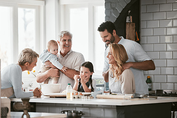 Image showing Big family, love and cooking in home kitchen, bonding or having fun. Support, care and grandparents, father and mother, baby and girl baking, learning and talking while enjoying quality time together