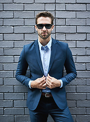 Image showing Fashion, sunglasses and business man by brick wall in Canada for company success, professional goals or targets, mission or vision. Portrait, boss and happy ceo standing against street wall outdoors.