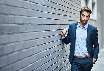 Image showing Business fashion, corporate style and man with luxury professional clothes, blue fabric suit and relax on wall. Designer apparel outfit, success and businessman with confident attitude in formal wear