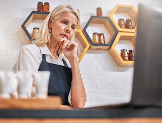 Image showing Stress, laptop and honey store owner with anxiety, business fail and loss from inflation, depression and worry. Senior woman, small business and issue at startup organic shop search online solution