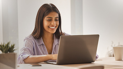 Image showing Internet, laptop and woman from India in home office, happy freelance worker at desk. Indian startup businesswoman with smile, technology and online project for trendy social media management company