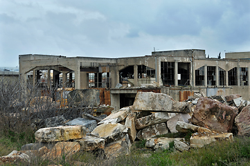 Image showing abandoned factory exterior and cloudy sky