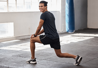 Image showing Stretching, fitness and smile with man in gym for training, health and workout muscle. Happy, wellness and exercise with energy athlete and warm up body for sports, performance and commitment