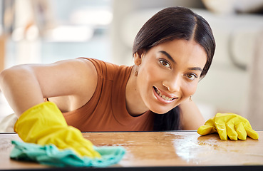 Image showing Smile, cleaning and fabric with portrait of woman and table for hygiene, bacteria and dust. Housekeeping, cleaner and washing with girl maid at home for disinfection, tidy and domestic with chores