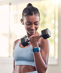 Image showing Fitness, exercise and dumbbell with indian woman, earphone and training in a gym for strong health or wellness. Sports, motivation and workout with a female athlete in a sports club for a workout