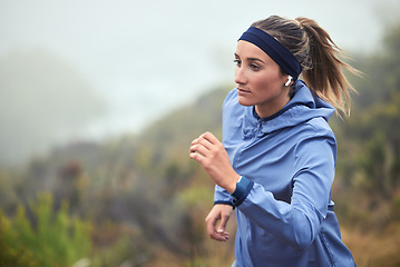 Image showing Fitness, woman and running in nature for exercise, training or cardio workout in healthy wellness. Active female runner exercising in sports run for health, endurance and wellbeing in the outdoors