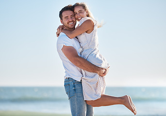 Image showing Couple portrait, love and beach holiday, travel and freedom in summer, happy smile and freedom in hawaii. Blue sky, nature and hug with man, woman and vacation together at ocean, sea and happy couple