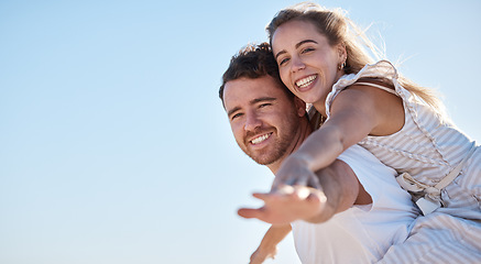 Image showing Love, blue sky and happy couple together for summer, holiday and outdoor wellness, date anniversary and freedom with mockup. Happy woman and man piggyback ride for support, care and healthy lifestyle