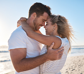 Image showing Beach, couple hug and forehead love connection from bonding people on outdoor nature date for peace and freedom. Marriage partnership, honeymoon and romantic man and woman on Sydney Australia holiday