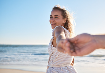 Image showing Couple, beach and holding hands with woman in pov with love, smile and quality time together. Girl, man and hand touch with happiness, bonding and romance by ocean for happy couple in summer sunshine