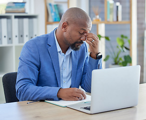 Image showing Business, black man on laptop and headache, stress and burnout, 404 glitch and mental health problem at office desk. Frustrated, sad and anxiety manager working on computer, debt crisis and failure