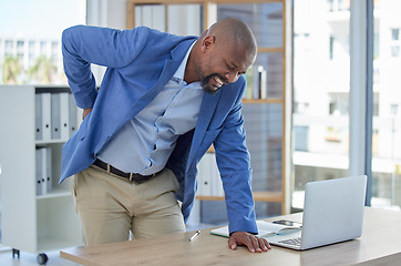 Image showing Back pain, spine and injury with businessman at desk for burnout, muscle and fatigue. Overworked, stress and accident with black man and body ache for exhausted, tired and inflammation problem