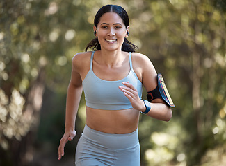 Image showing Fitness, woman and running portrait, exercise and training for marathon, cardio and smile in park or forest. Runner, workout and motivation run, happy and healthy lifestyle and body wellness nature