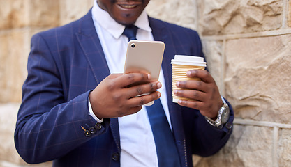 Image showing Travel, coffee and hands of businessman with phone on walk commute for social media, email or ecommerce. Technology, internet and corporate black man on outdoor break with 5g mobile connection.