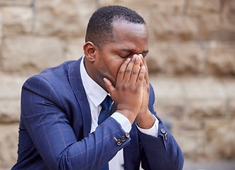 Image showing Businessman, stress and anxiety in city from unemployment, resignation or fired from Nigerian corporate company. Worker, unemployed employee or sad executive with mental health, depression or burnout