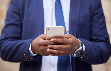 Image showing Business, man and phone in the hand of a finance accountant while trading online in the office. Financial, accounting and hands of a businessman browsing online on a cellphone for investments